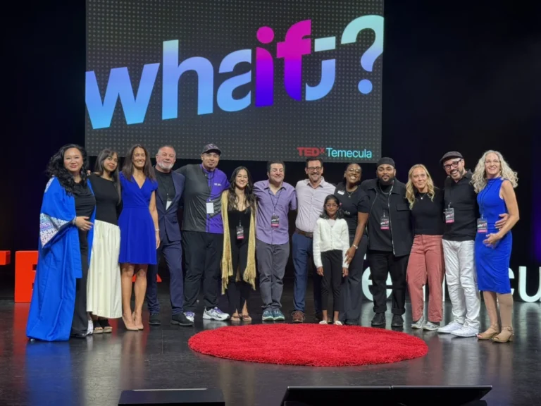 TEDx Temecula 2026 speakers on stage, including Dr. Hassan Bencheqroun